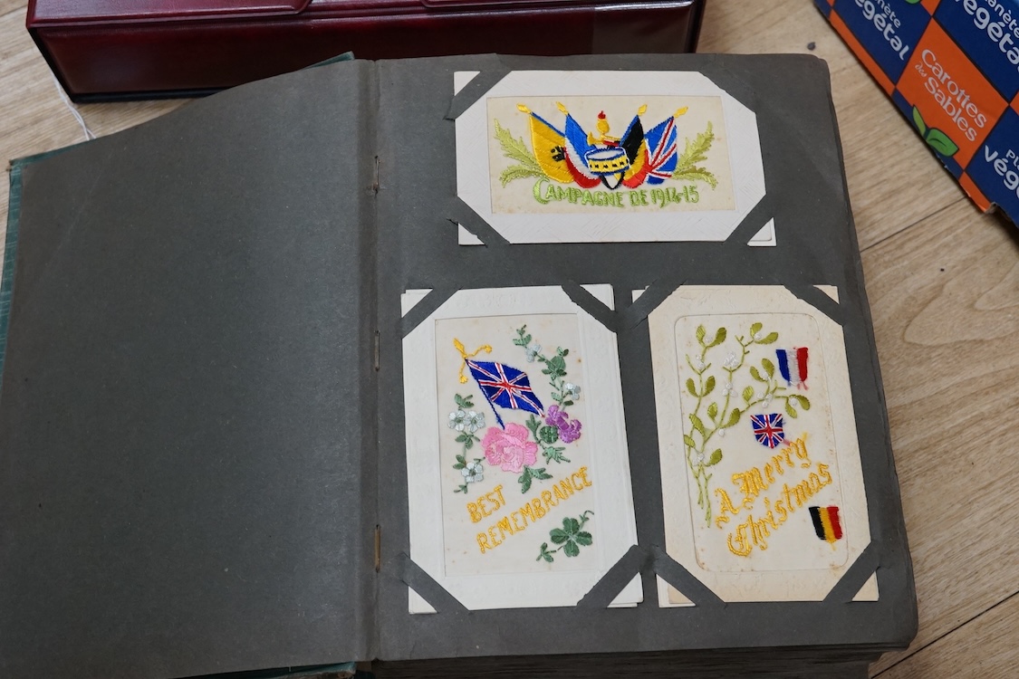 A collection of early 20th century postcards, photographs, etc. Including three albums of novelty postcards, scenes of London, etc. First World War postcards, etc. and an Edwardian photograph album, together with four bo